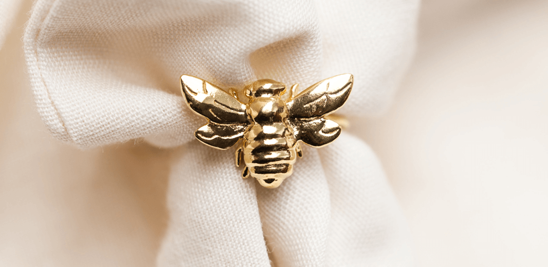 imagen de broche chapa de oro